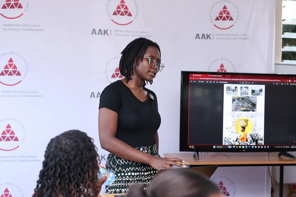 A participant presenting her work on screen at a Biennale session