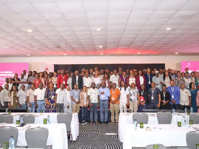Delegates in a group photo in the main hall