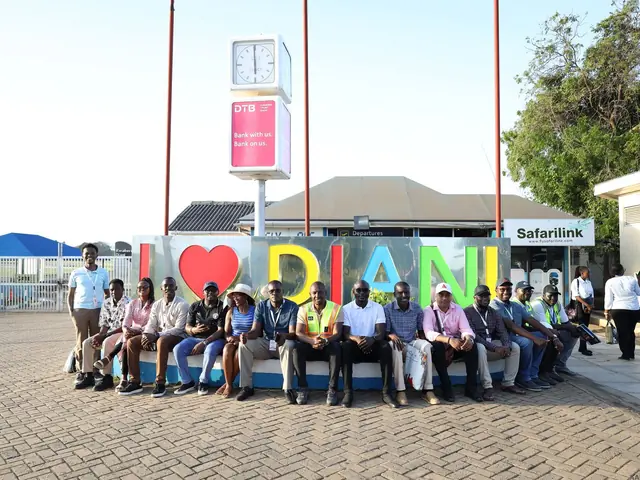 Delegates at the I Love Diani sign