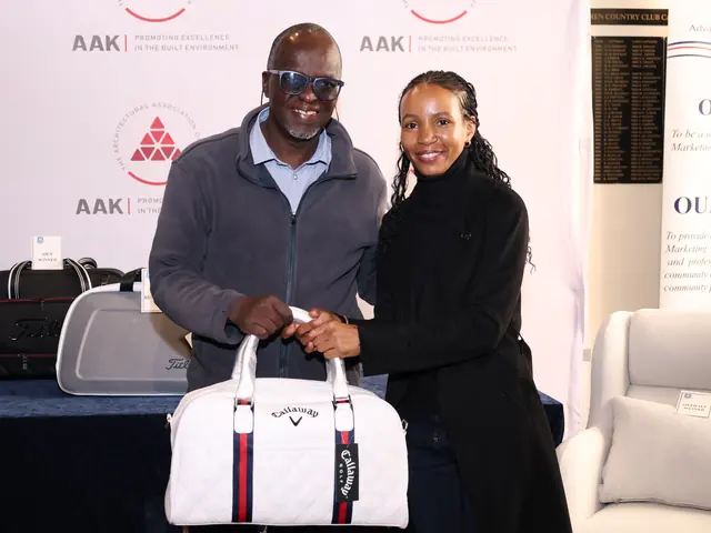 A winner receives her prize