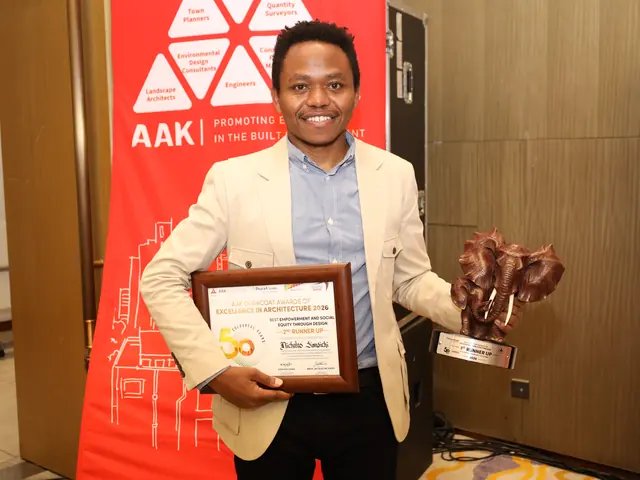 An award recipient with his trophy and certificate