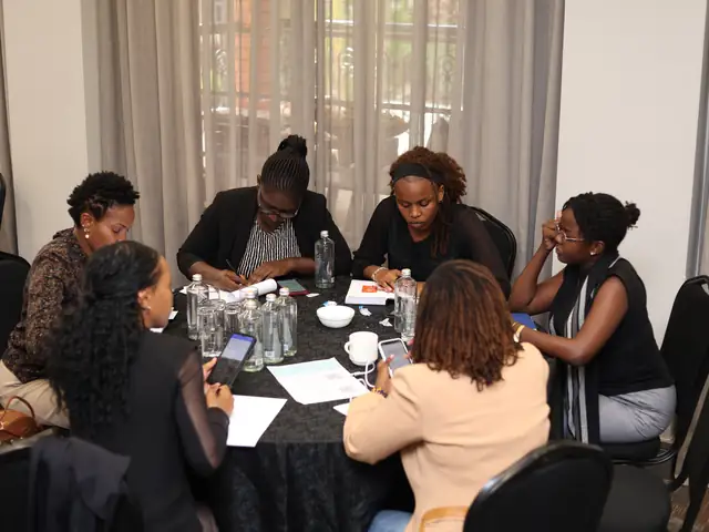 Participants work together at a table