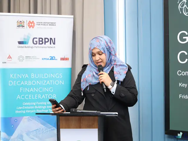 A speaker presents from the podium