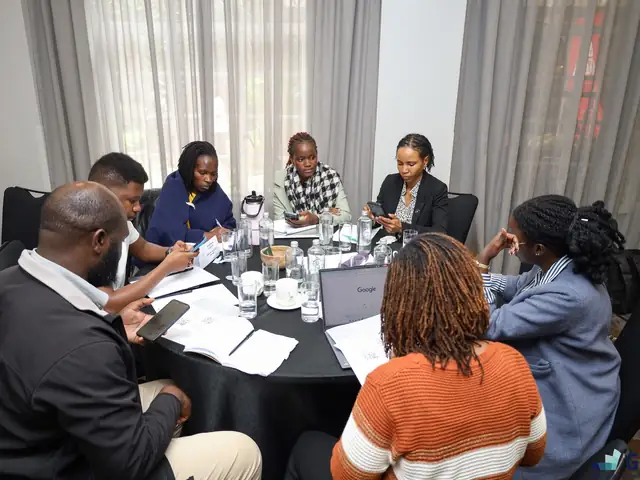 Participants work through an exercise in small groups