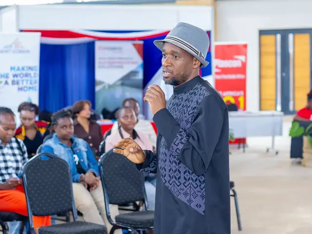 A speaker addresses the audience