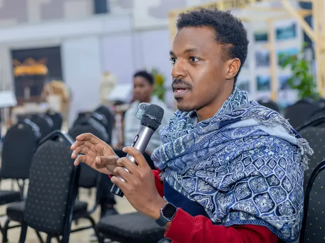 A participant speaks during a discussion