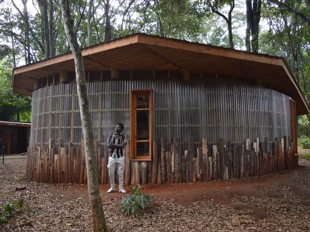 A round classroom clad in vertical timber slats