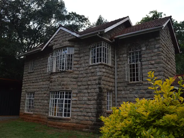 A stone house on the school campus